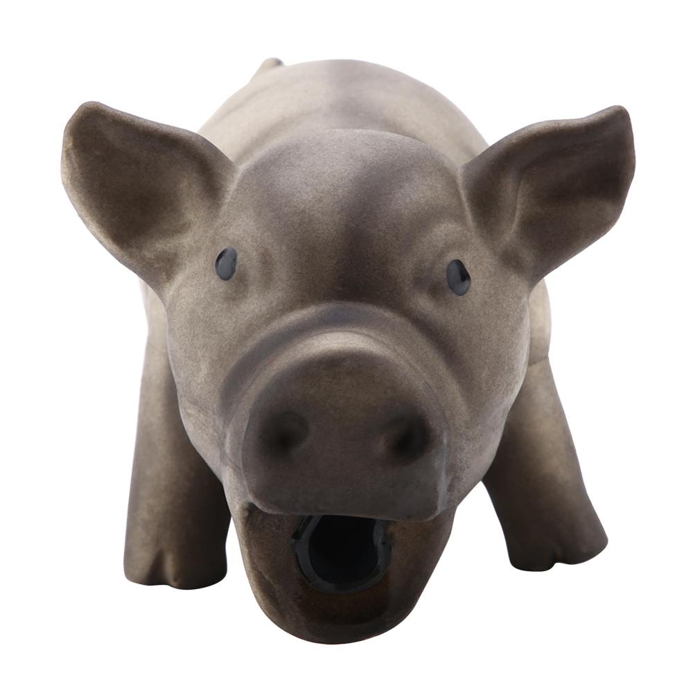 Søte gummi griser som lager gryntelyder. Perfekt til valper som klør i tennene
